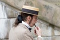 Elegant man wearing old fashioned hat and pipe Royalty Free Stock Photo