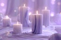 Elegant marble-patterned candles arranged elegantly in a tranquil, softly lit setting Royalty Free Stock Photo