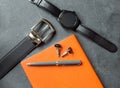 Elegant men`s business accessories. Black watches, belt, notepad, pen, cufflinks.Ã¢â¬Â¨