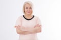 Elegant middle aged woman posing with pink dress over white Royalty Free Stock Photo