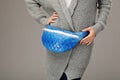 Elegant model with a fanny pack. Closeup picture Royalty Free Stock Photo