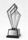 Elegant modern award trophy with silver and crystal elements on white background Royalty Free Stock Photo