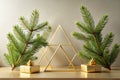 Elegant Modern Home Decor Golden Geometric Triangles and Pine Branches Create a Cozy and Minimalist Atmosphere for a Royalty Free Stock Photo