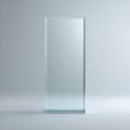 Elegant and Modern Transparent Glass Panel Standing on a Minimalistic Surface with Soft Shadows and an Ambient Background Royalty Free Stock Photo