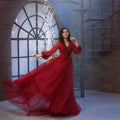 Elegant movements of the princess dance, luxurious wonderful dress in red easily flies and flutters, the queen in the