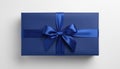 Elegant Navy Blue Gift Box with Satin Ribbon Bow Top View on a Neutral Background for Celebrations Royalty Free Stock Photo