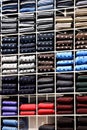 Elegant neckties on shelves in a store Royalty Free Stock Photo