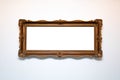 Elegant old blank white picture frame template, empty inside. Elegant wide painting frame hanging on the wall, copy space, mockup