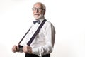 Elegant pensioner showing his new suspenders Royalty Free Stock Photo