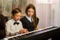 Elegant Piano Duet at Home Royalty Free Stock Photo