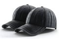 Elegant picture of three black baseball caps isolated on white background, different angles, hyper realistic Royalty Free Stock Photo