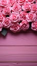 Elegant pink roses form a charming frame against a pink wooden backdrop