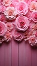 Elegant pink roses form a charming frame against a pink wooden backdrop