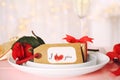 Elegant place setting for romantic dinner on pink table, closeup. Valentine`s day celebration Royalty Free Stock Photo