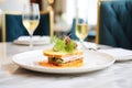 elegant plating of croque monsieur at a high-end brasserie