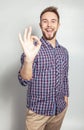 Elegant & positive young handsome man. Studio fashion portrait.