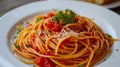 Elegant Presentation: Spaghetti Pomodoro Delight on a White Plate -