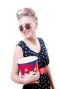 Elegant pretty funny young blond pinup woman with curlers round sunglasses holding popcorn happy smiling looking at camera isolate Royalty Free Stock Photo