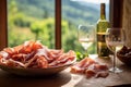 Elegant prosciutto display, with a Tuscan vineyard softly blurred in the background.