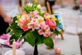 Elegant red flowers bouquet standing on table Royalty Free Stock Photo