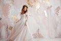 Elegant red-haired girl bride. Young beautiful woman in wedding dress Royalty Free Stock Photo