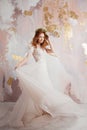 Elegant red-haired girl bride. Young beautiful woman in wedding dress Royalty Free Stock Photo