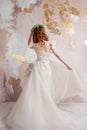 Elegant red-haired girl bride. Young beautiful woman in wedding dress Royalty Free Stock Photo