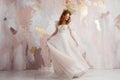 Elegant red-haired girl bride. Young beautiful woman in wedding dress Royalty Free Stock Photo