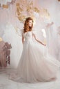 Elegant red-haired girl bride. Young beautiful woman in wedding dress Royalty Free Stock Photo