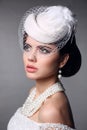 Elegant Retro Bride Model Wedding Portrait. Pearls Jewelry and H