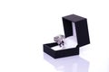 Elegant ring showcased in a sleek black box, set against a clean white backdrop. Ideal for jewelry ads, gift-giving campaigns, or