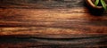 Elegant rustic wooden table top background texture with soft warm light and ample copy space area Royalty Free Stock Photo