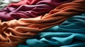 Elegant satin fabric folds in a range of colors from deep burgundy to soft cream