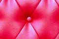 Elegant saturated glossy red leather texture of sofa chair Royalty Free Stock Photo