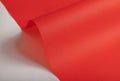Elegant scarlet red paper background with a fine texture and subtle gradient. Featuring soft folds