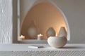 Elegant scented candle display Elegant minimalist style on white shelves with textured vases and artistic illumination AI