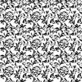 Elegant seamless pattern. Tracery of swirls and leaves on a whi Royalty Free Stock Photo