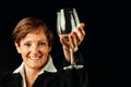 Elegant senior toasts millennia of wine culture