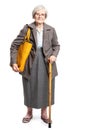 Elegant senior woman with walking stick