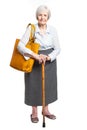 Elegant senior woman with walking stick on white