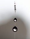 Elegant Sequence of Reflective Water Droplets on Silk Royalty Free Stock Photo