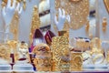 Elegant shiny jewelry in shop window. Gold market in old town of Dubai. Jewelry Bazaar. Gold Souk in Sharjah