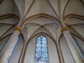 Elegant side window and ceiling section in a Christian church