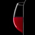 Elegant silhouette bottle of red wine and glass on black background Royalty Free Stock Photo