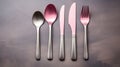 Elegant Silver Cutlery Set with Pink Handles on Grey Background AI Generated