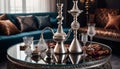 Elegant Silver Hookah Set on a Mirrored Coffee Table with Decorative Cushions Royalty Free Stock Photo