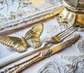 Elegant Silver Table Setting with Butterfly Jewelry