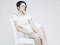 Elegant sitting lady Royalty Free Stock Photo