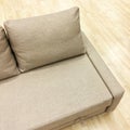 Elegant sofa-bed on wooden floor Royalty Free Stock Photo