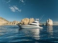 Elegant sportfishing yacht in the ocean in Cabo, Mexico sailing leisurely through a tranquil bay